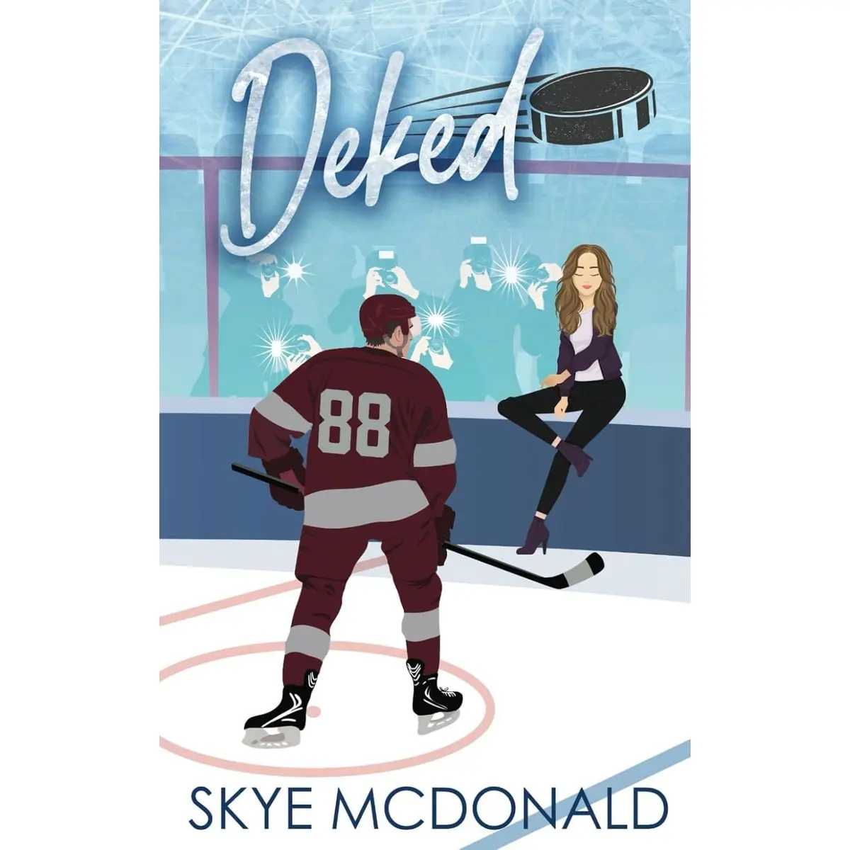 Deked: An Older Woman/Younger Man, Steamy Hockey Romance (Connecticut Commodores) Paperback – April 5, 2025
