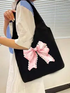 Cute bow print canvas shoulder bag in trendy Y2K style. Comes with printed tote and small pouch. Spacious cosmetic bag perfect for outdoor use. Ideal for weddings, beach trips and festivals, great gift choice for loved ones.
