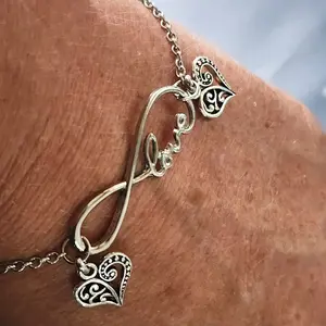 Must-Have Bracelet Infinity Love Charm with Detailed Heart Charms and Elegant Chain Design for Everyday Wear and Versatile Gift HandmadeJewelry GothicChic LoveSymbol CharmBracelet