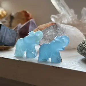 Natural lemurian aquatine calcite elephant crystal carving