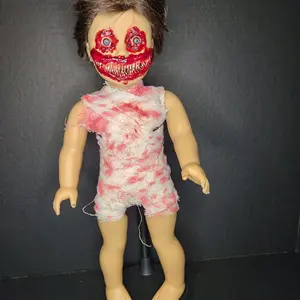 Creepy horror doll Happy boy Beau