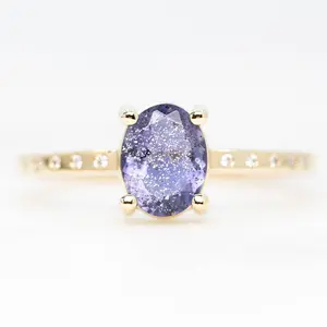 Heath Ring with a 0.74 Carat Oval Iolite and White Accent Diamonds in 14k Yellow Gold - Ready to Size and Ship