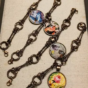 Copper tone charm bracelets! 7.5" long