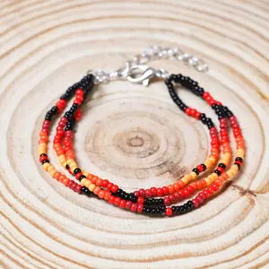 Sunset Harmony Beaded Bracelet - Bold Red, Orange, Yellow, and Black Strands