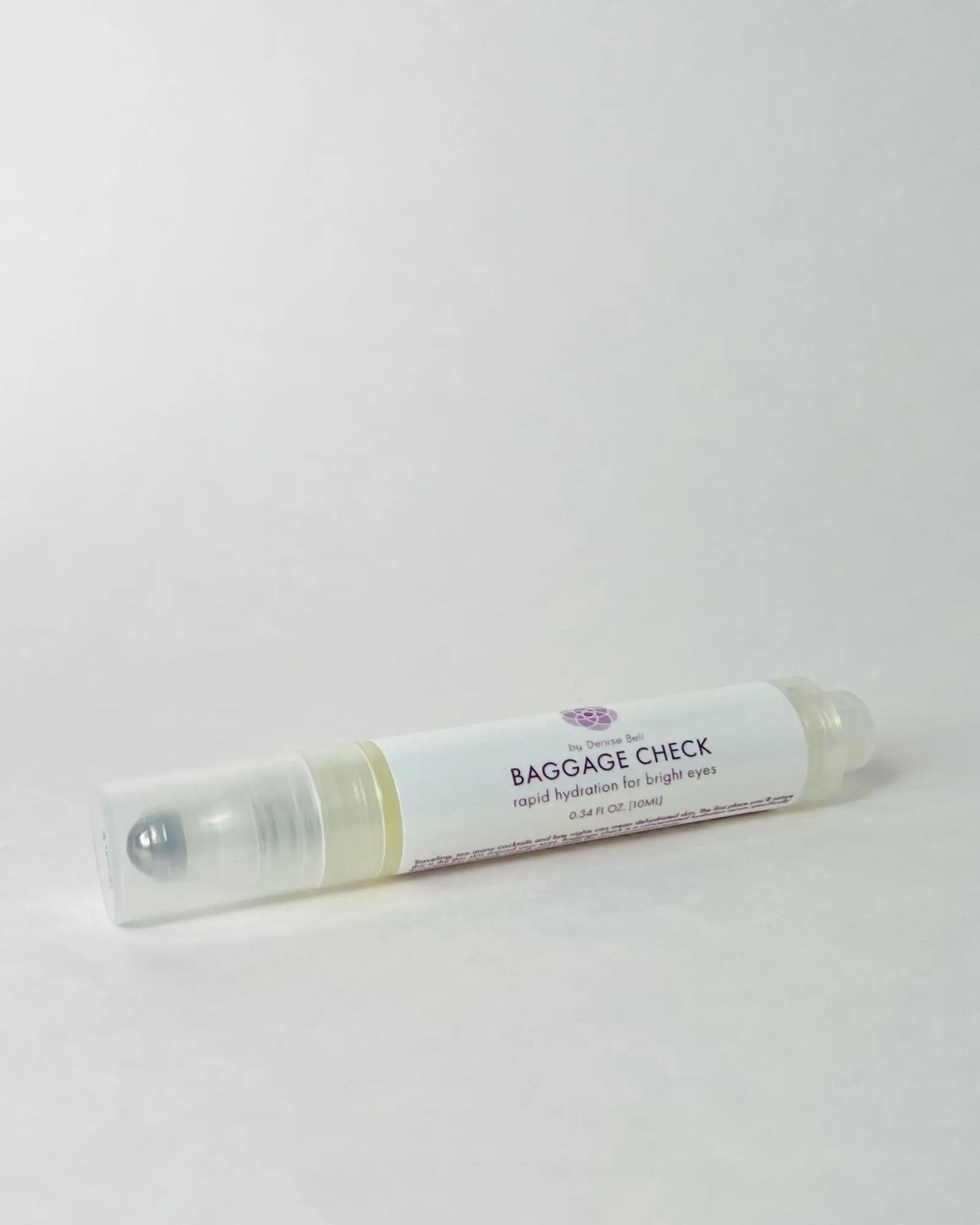 Baggage Check Eye Serum Cooling Under-Eye Roller for Puffiness & Dark Circles with Hesperidin Methyl Chalcone & Dipeptide-2 Smooth Gentle hydrating eye serum