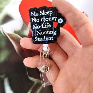 A nursing student theme work card retractable buckle, the main body is designed with black glitter, equipped with a retractable structure and a transparent clip, which can be used to hang work cards. Id Badge Holder