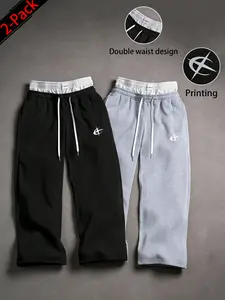 2-pack unisex Y2K street-style jogging pants, baggy wide-leg sweatpants, faux two-piece color-block design with double waistband featuring elastic waistbands and drawstring; men’s casual printed jogging pants in a street-style everyday long pant design.