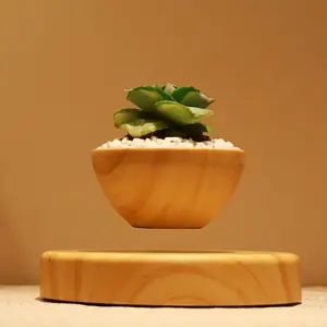 Magnetic Levitation Wood Grain Round Flower Pot (Plant Not Included) features a unique levitation effect, suitable for air plants and bonsai. It can rotate and is a home gardening accessory as well as a Christmas gift for flower pot lovers.