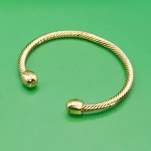 2.1-inch Adjustable Diameters gold color Magnetic Bracelet 4.4mm Thick Stainless Steel 14-Karat Gold Plated Twisted Design not water resistant