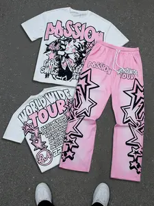 Men's round-neck short-sleeve set with long pants, featuring a pink and black graffiti-style lettering and portrait print; a vibrant, casual athletic look with a drawstring waistband; sweet yet edgy, trendy style