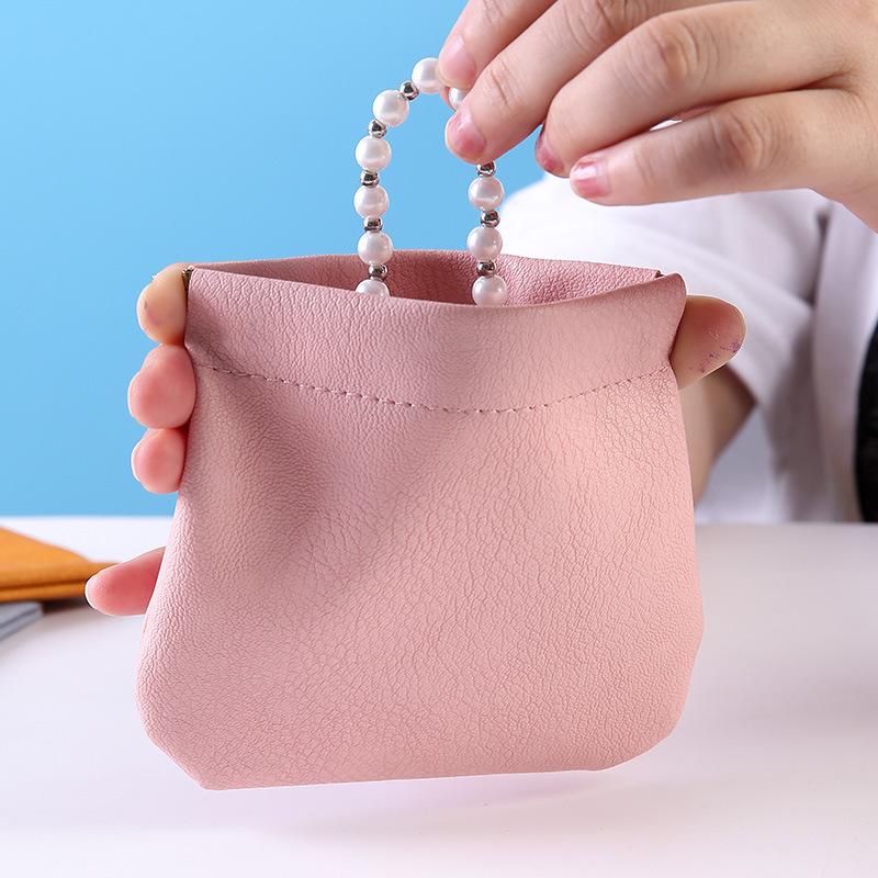 Mini storage bag, key chain, portable cosmetic case, snap fastener, printed lipstick, small bag for carrying odds and ends, portable.