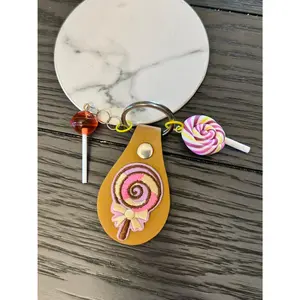 Sweet Swirl Delight: Lollipop Keychain Charm