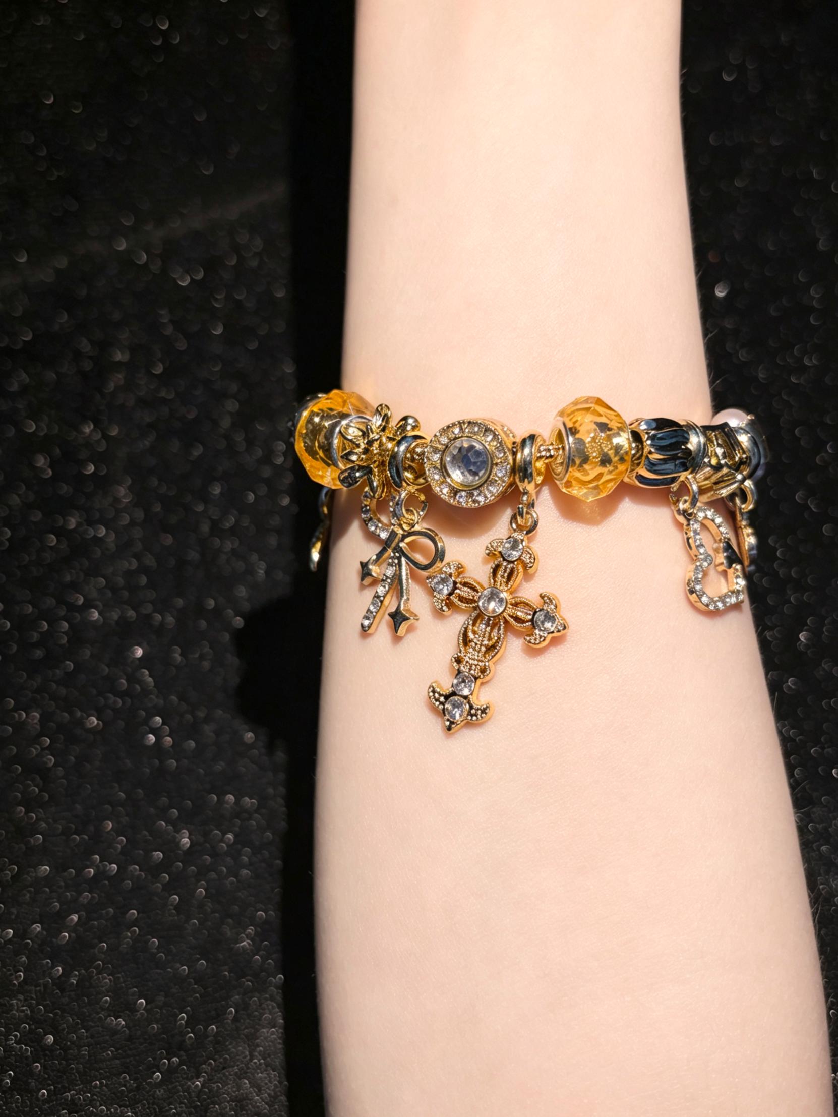 Women's Gold-Tone Adjustable Snake Chain Bracelet with Cross, Butterfly and Crystal Charms, Elegant Costume Jewelry Gift for Daily Wear