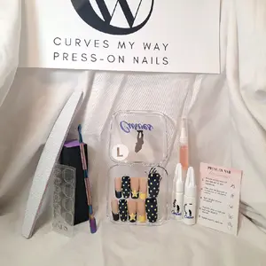 "CMW Press-On Nails, size large. Square-shaped with a starry night twist! These bold navy squares feature bright yellow polka dots, stars, and delicate silver beads—a perfect pop of celestial glam!"