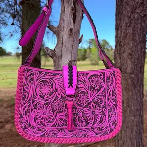 Pink Floral Embossed Leather Crossbody Bag with Braided Strap and Tassel Detail