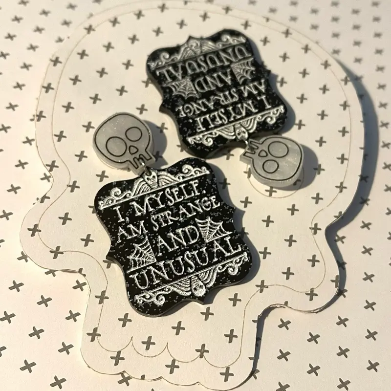 ‘I Myself Am Strange and Unusual’ Skull Dangle Earrings | Gothic Beetlejuice-Inspired Statement Jewelry