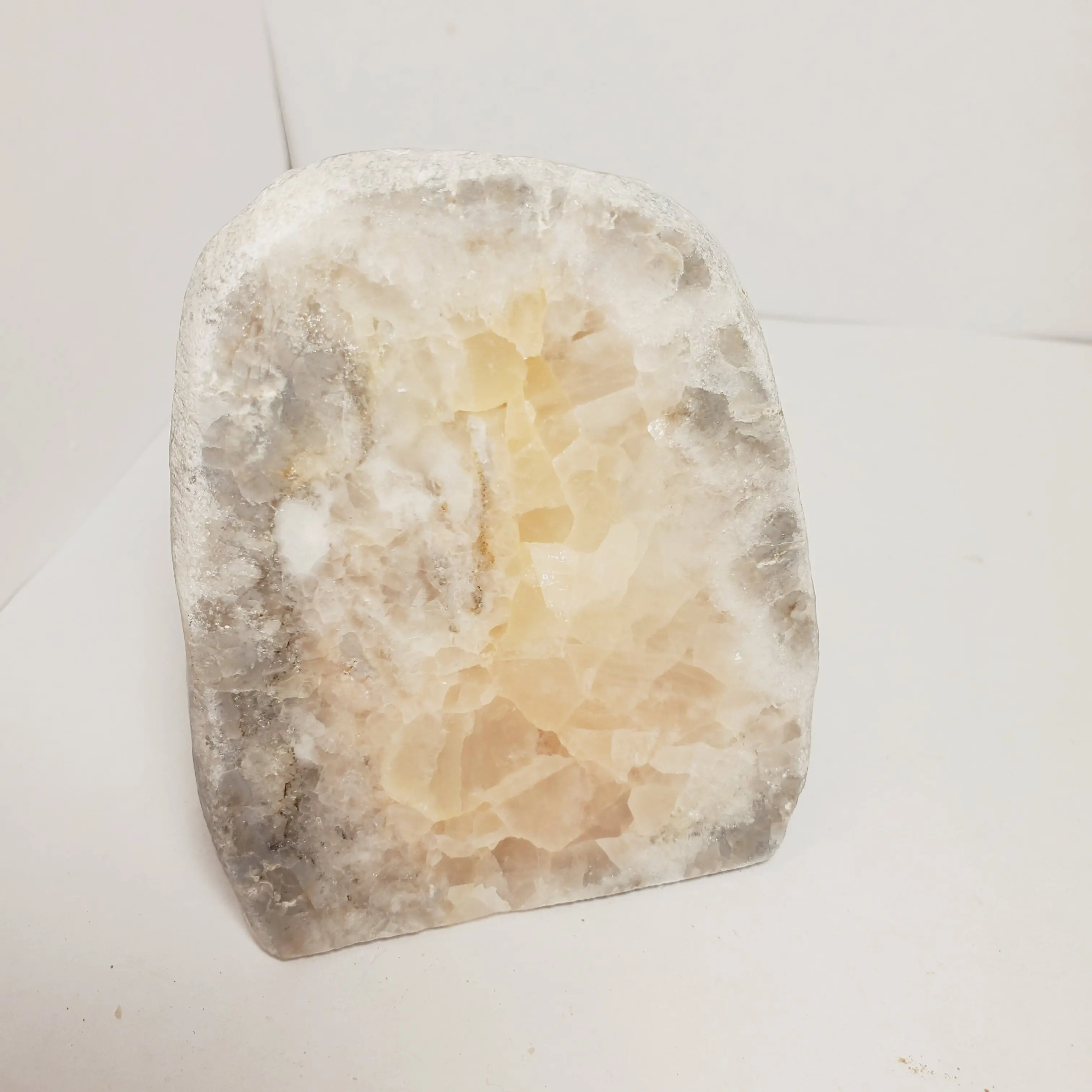 Polished Keokuk Geode with Eye-Catching Pink Calcite, Natural UV Reactive Crystal Display Piece Cut to Stand, Polished Stone