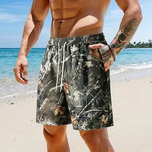 2026 Summer Men’s Camouflage Swim Shorts — Lightweight, breathable beach shorts suitable for surfing and everyday wear, featuring a drawstring elastic waistband and breathable textured fabric; summer beach streetwear athletic shorts