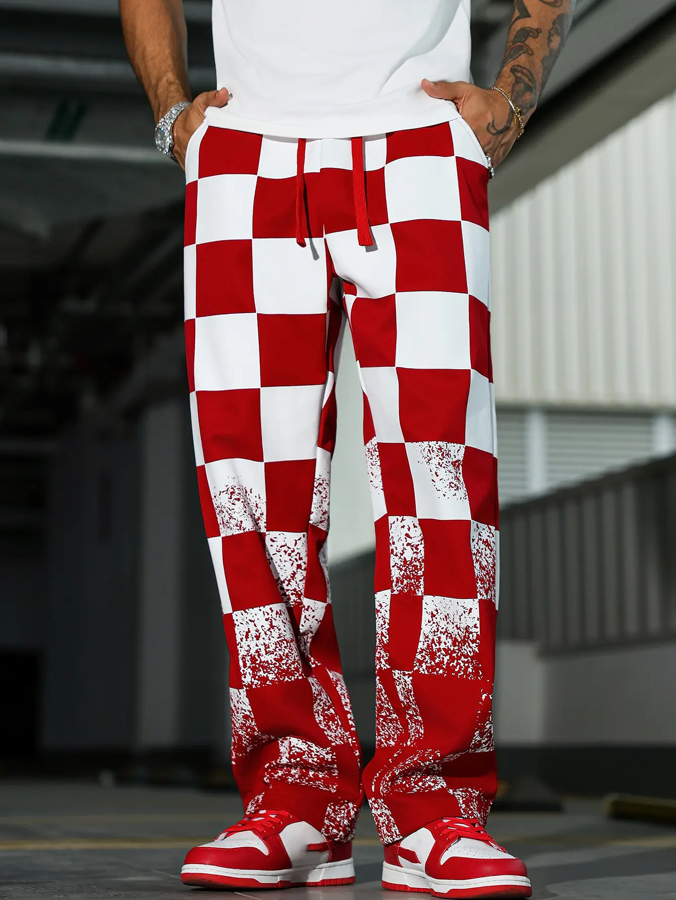 Y2K plaid wide-leg pants | Red and white splattered street-style bottoms, summer menswear, red checkered Y2K style