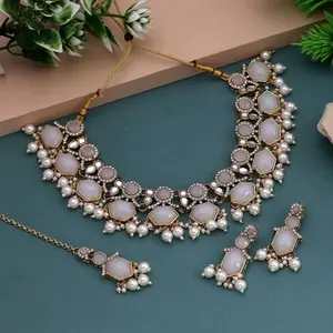 Dazzling Polki and Kundan Stones Necklace and Earrings Set with Tikaa in Alloy Coating for Every Occasion