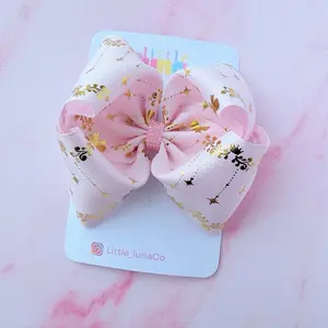 Moño boutique con detalles dorados