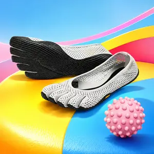 The lady wears a mesh netted open-toe sandals, breathable toe-separating minimalist training shoes, anti-slip zero-drop lightweight shoes. These are suitable for yoga, pilates, ballet, indoor exercises and daily walking.