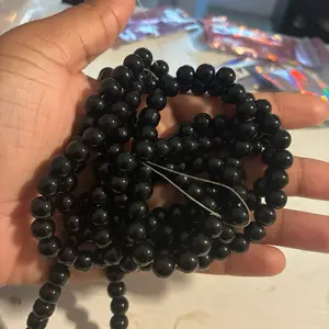 Kissit- black 8mm bead strand