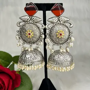 German Silver Jhumkas with Mona Lisa Stone, Pearls, and Decorative Elements in Elegant Design
