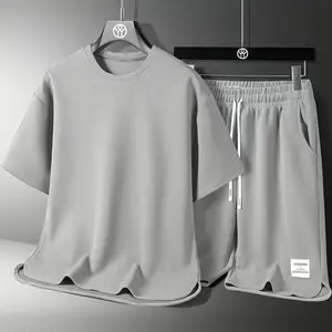 Men’s two-piece summer casual set featuring a crew-neck short-sleeve T-shirt and letter-print drawstring shorts in a breathable waffle fabric. Suitable for summer running, beach vacations, weekend outings, hiking/fishing, and everyday workouts.