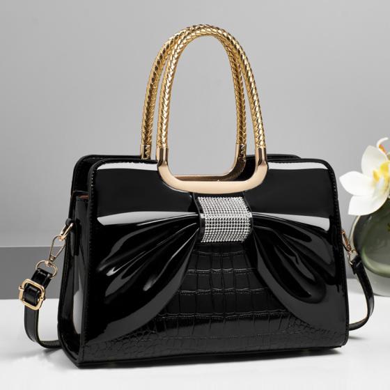 Women’s glossy leather handbag with top handle — medium-structured shoulder/handbag with adjustable strap