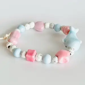 Bracelet whale dolphin pastel blue pink White Ceramic Beaded Stretchy