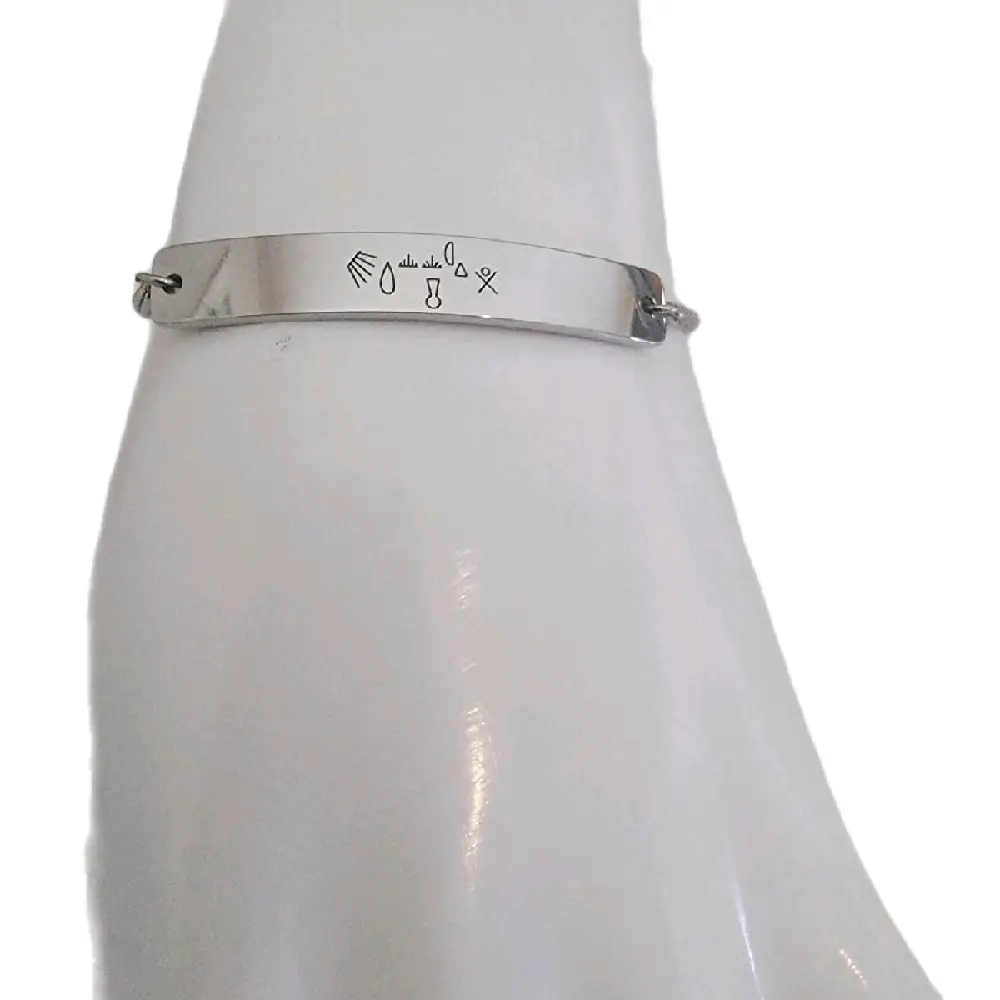 Stainless steel brazalete with engraved symbols Auspicious