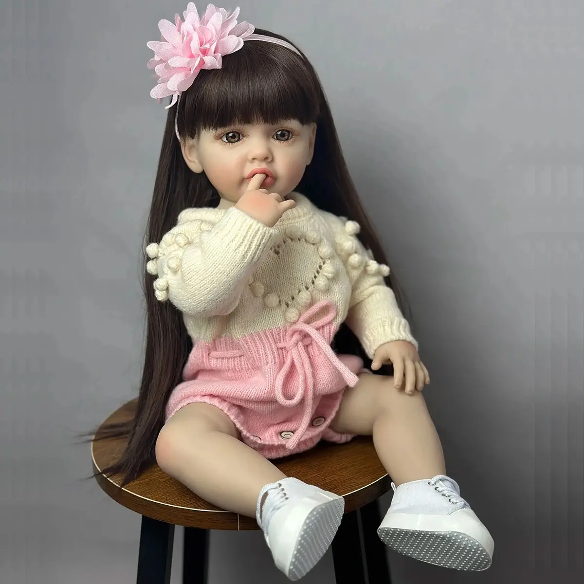 22-Inch (55cm) Lifelike Reborn Baby Doll, Soft Brown Hair, Pink Knit Outfit with Accessories, Comfortable Design, Ideal for Bathing, Birthday Gifts