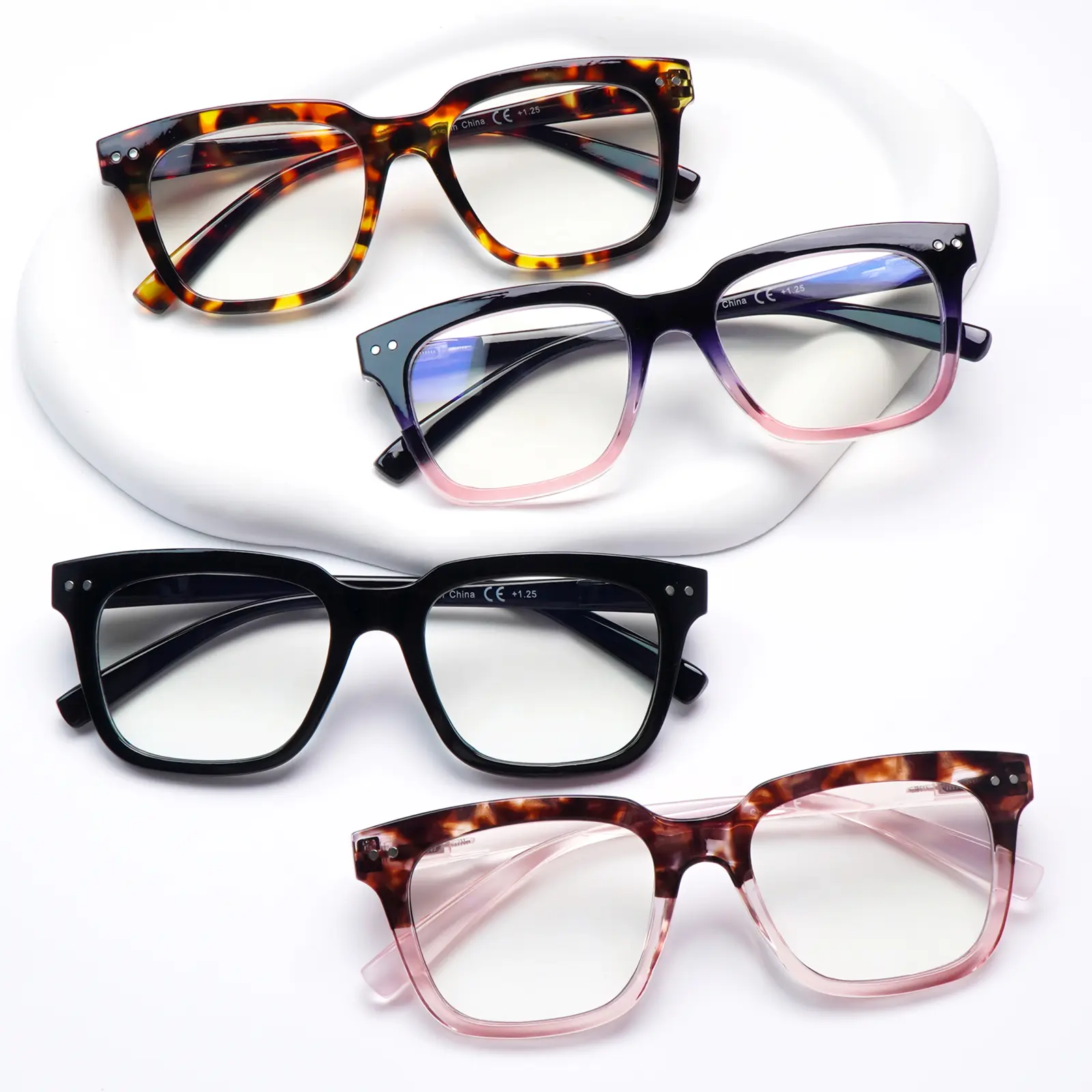 4-Pack Blue Light-blocking Reading Glasses, designed for women, feature stylish printed frames and an oversized design. Equipped with spring-loaded metal hinges, they cater to a variety of needs. They make an excellent choice for holiday gifts.
