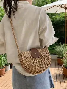 Fresh and artistic retro fashion openwork mesh woven single shoulder bag, featuring a semi-circular design with a soft, romantic vibe and minimalist texture, ideal for beach vacations, dates, and gatherings