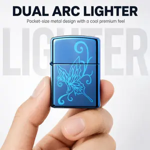 Rechargeable dual-arc electronic lighter, USB-C flameless pocket lighter with a blue metallic casing and embossed butterfly pattern, suitable for outdoor use, camping, and aromatherapy lighting.