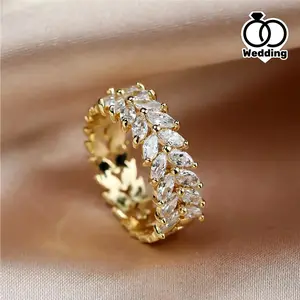 Elegant Vintage-Style Ring for Women Featuring a Marquise Cut White Stone in a Beautiful Yellow Golden Leaf Design, Perfect for Bridal Or Wedding Occasions