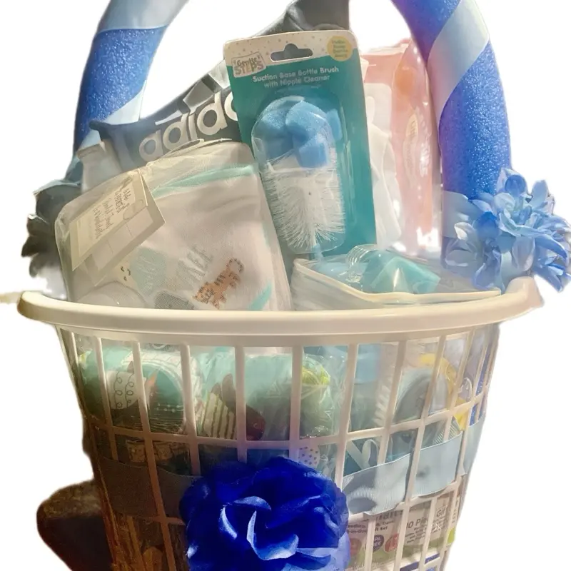 Hand made Boy Basket - Assorted Toys in Clear Plastic Packaging with Blue Ribbon