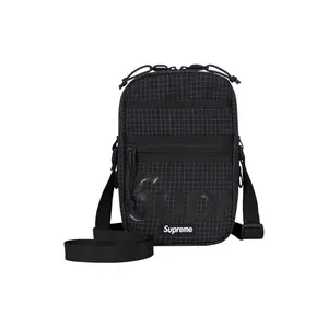 Supreme SS24 Week 1 Reflective Tear-Resistant Embossed Logo Polyester Shoulder Bag for Men and Women in Black
