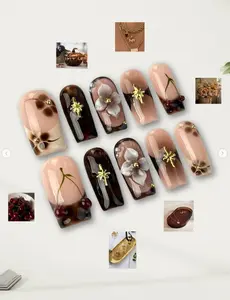 Vintage mocha cherry latte nails with 3D florals, golden accents and glossy caramel tones — a warm luxurious autumn aesthetic for elegant romantic souls