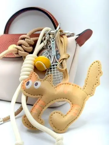 Cute Cat Tennis Bag Charm – Fun Beige Cat Keychain with Racket