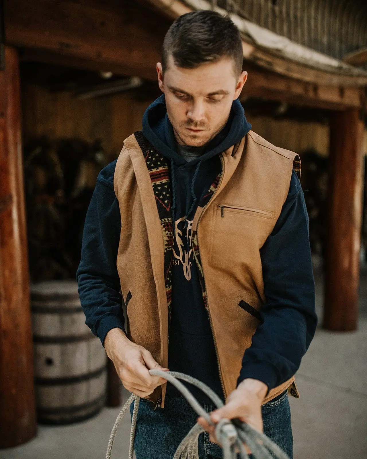 Men's Sawbuck Oilskin Vest, Waterproof Cotton with Nubuck Leather Trim, Elastic Waistband and Interior Security Pocket