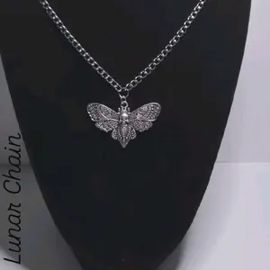 Lunar Moth Chain - Elegant Silver Tone Necklace with Detailed Moth Pendant for Women