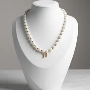 Colección Armonía. Collar Nota Musical Dorada