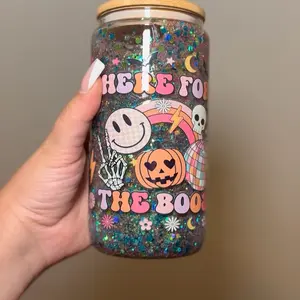 Halloween Glitter Tumbler 16 oz - Here For The Boo's Design with Skulls & Pumpkins on Glittered Background