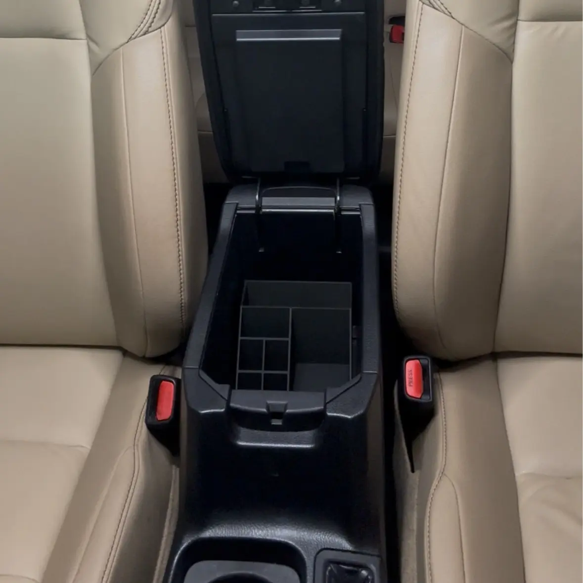 Vynity: Vehicle Vanity, a car cosmetics organizer that fits into car consoles