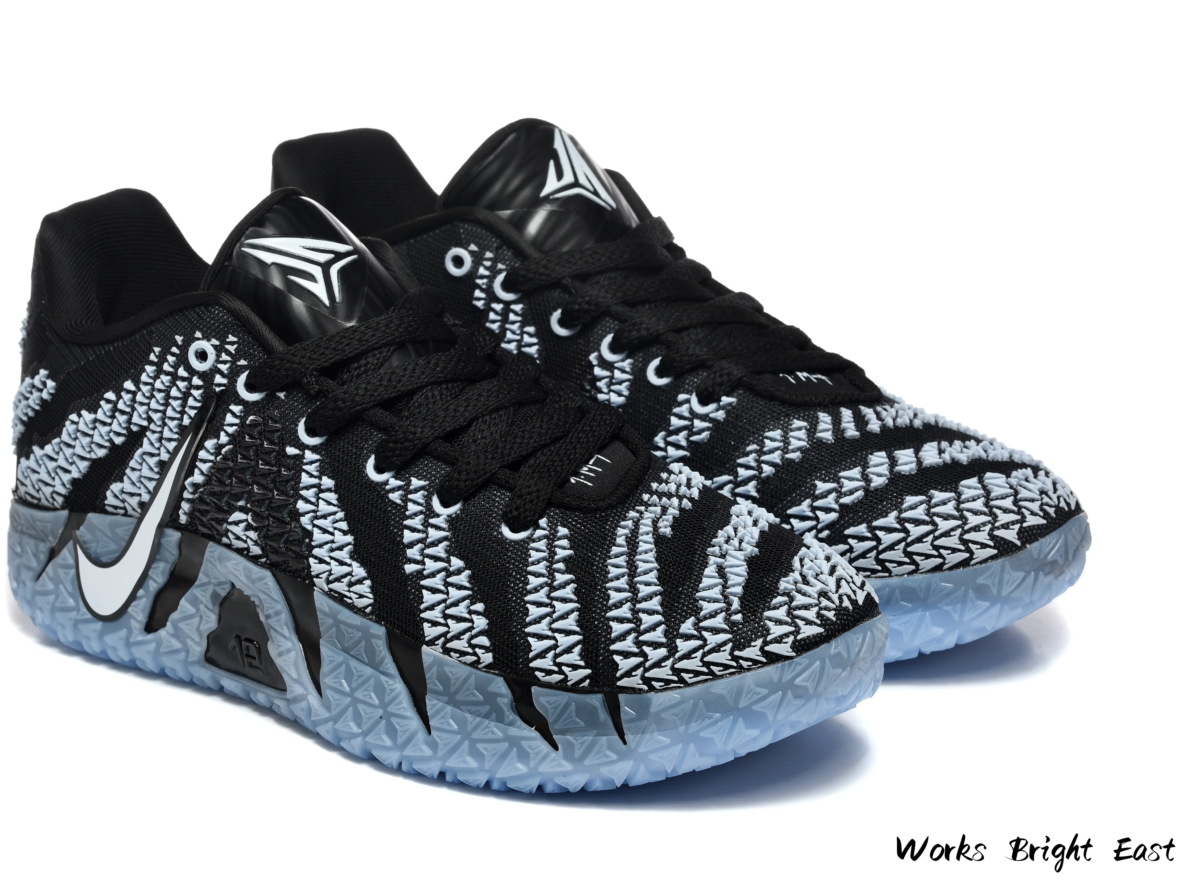 Black and Light Blue Low-Top Basketball Sneakers with Textured Overlay and ZoomX Cushioning