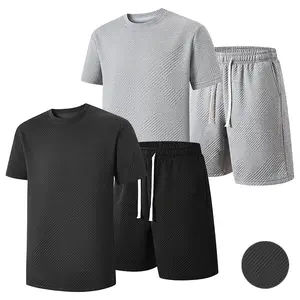 Men’s fashion casual sports set with a loose fit and a drawstring elastic waistband; versatile for both activewear and casual wear; trendy light athleisure style for men.