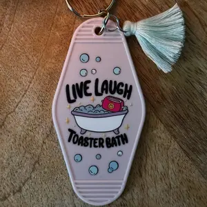 Live Laugh Toaster Bath Motel Style Keychain with Tassel Pink Design