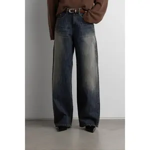 MID-RISE CURVED LEG DARK WASH JEAN